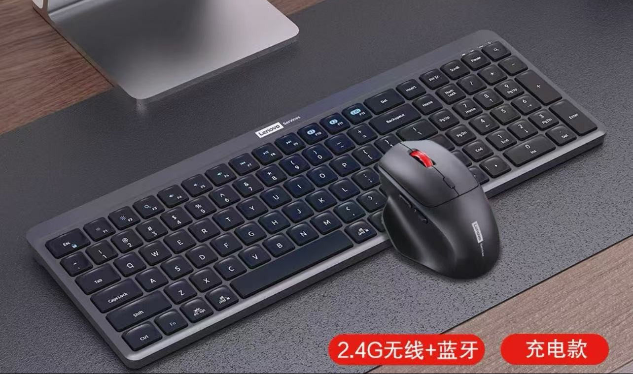 Lenovo keyboard and mouse set on a desk with Lenovo Services branding.